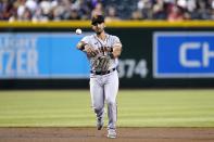 San Francisco Giants second baseman David Villar throws to first base to get Arizona Diamondbacks' Ketel Marte out during the first inning of a baseball game Tuesday, July 5, 2022, in Phoenix. (AP Photo/Ross D. Franklin)