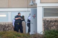 <p>Police search a building at YouTube’s corporate headquarters as an active shooter situation was underway in San Bruno, California on April 03, 2018. (Photo: Josh Edelson/AFP/Getty Images) </p>