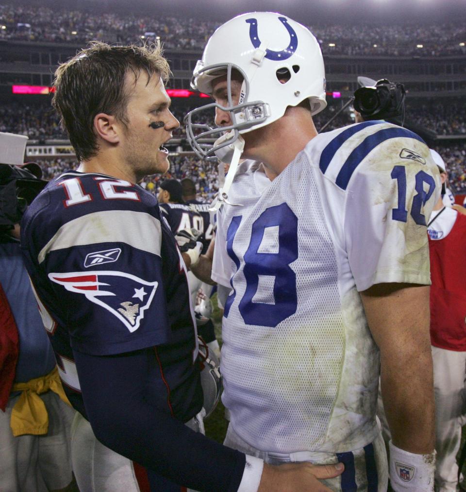 New England Patriots quarterback Tom Brady chats with Indianapolis Colts quarterback Peyton Manning after the Patriots beat the Colts, 27-24, on Sept. 9, 2004, in Foxborough, Mass.