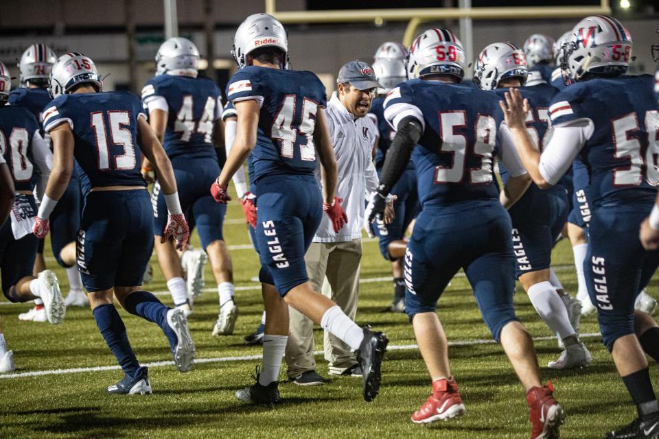 Veterans Memorial head football coach Ben Bitner rallies his team before the 5A-1 Region IV, bi-district playoff game, Friday, Nov. 12, 2021 at Buccaneer Stadium. 