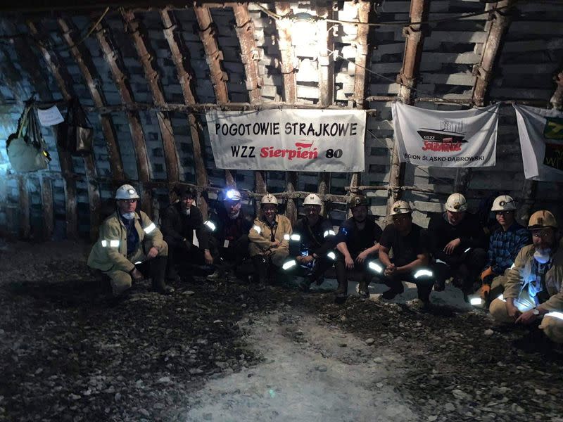 Miners are pictured during their underground protest in Myslowice-Wesola mine in Myslowiece