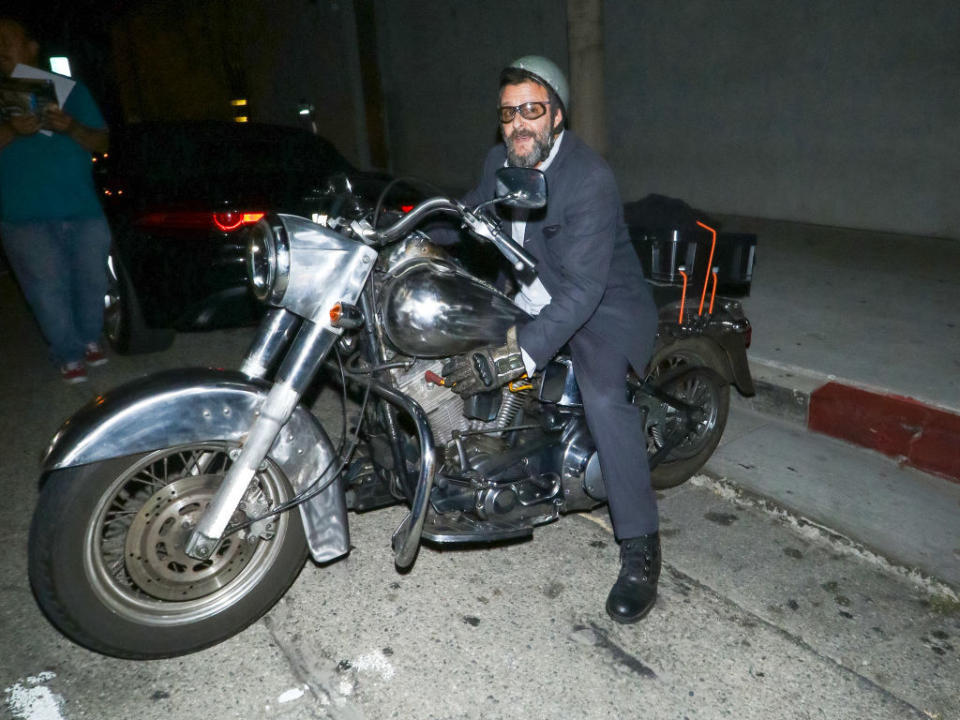 Judd Nelson on a motorcycle