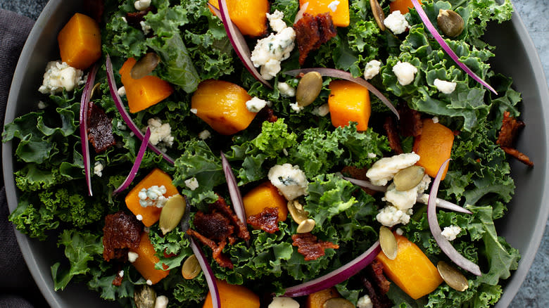 kale salad with squash and blue cheese