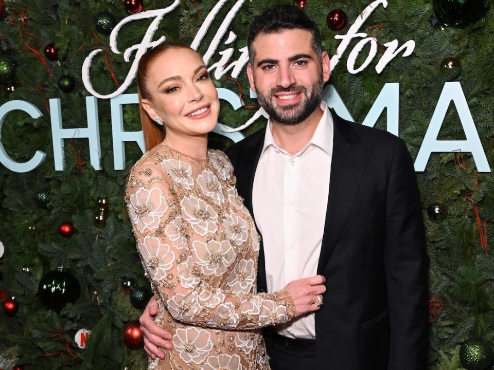 Lindsay Lohan and Bader Shammas at the "Falling for Christmas" premiere on November 9, 2022.