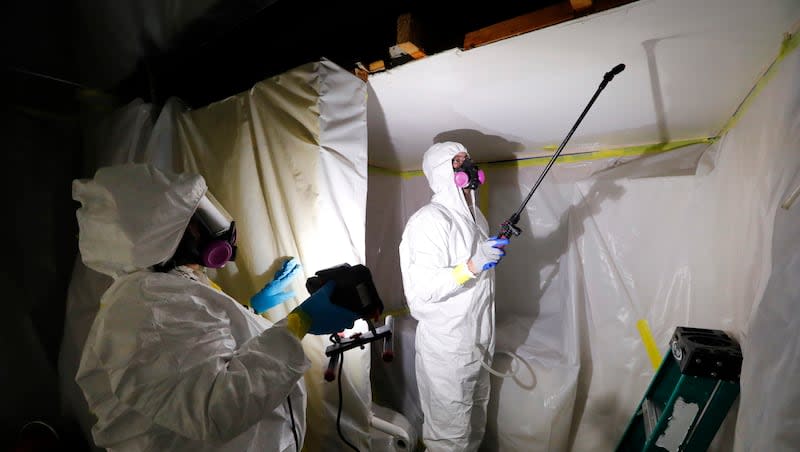 Asbestos Removal Technologies Inc. staff work on asbestos abatement in Howell, Mich., Oct. 18, 2017. The Environmental Protection Agency on Monday, March 18, 2024, announced a comprehensive ban on asbestos, a carcinogen that kills tens of thousands of Americans every year but is still used in some chlorine bleach, brake pads and other products.