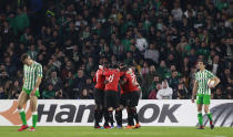Rennes' players celebrate after Adrien Hunou scored during the Europa League round of 32 second leg soccer match between Betis and Rennes at the Benito Villamarin stadium, in Seville, Spain, Thursday, Feb. 21, 2019. (AP Photo/Miguel Morenatti)