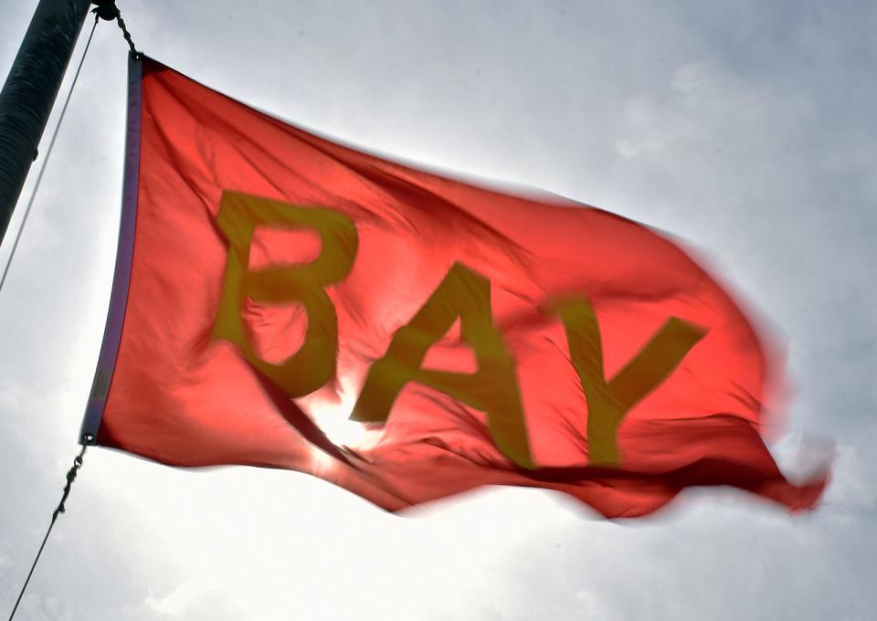 A red flag at Swansea Town Beach signifies that the water is closed to the public Friday morning Sept. 15, 2023.