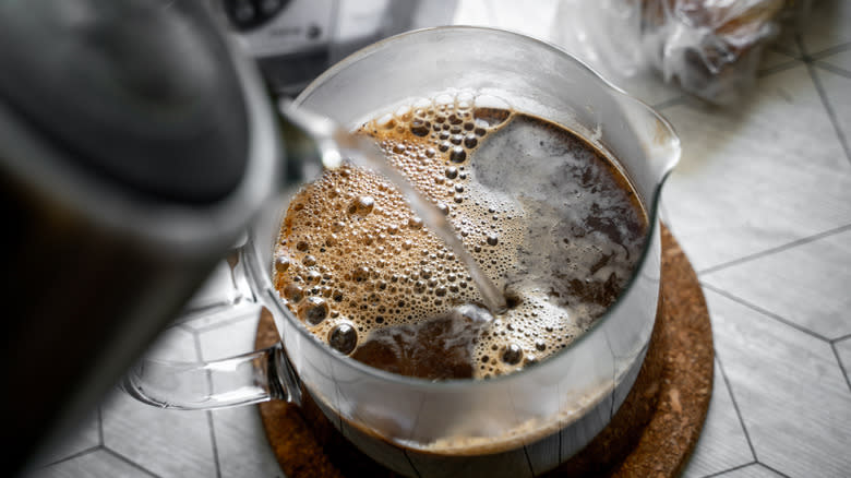 Boiled water poured into coffee 