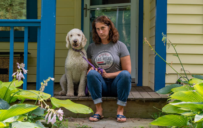 Kami Lewis and her dog Abby in Canaan, NY on August 6, 2019. Kami and her family are leaving the United States for Costa Rica due to the political climate within the United States.  (Photo: David 'Dee' Delgado for Yahoo News 