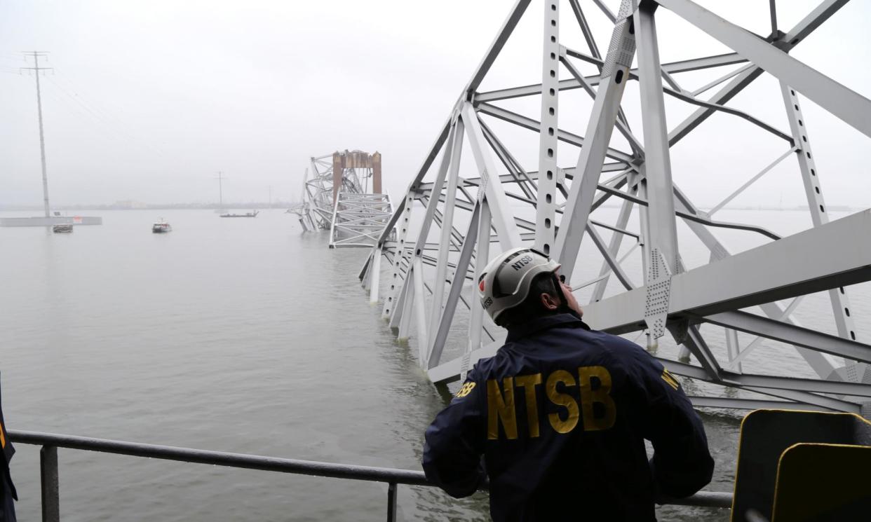 <span>NTSB investigators inspect damage from the cargo vessel Dali, which struck and collapsed the Francis Scott Key Bridge on Wednesday in Baltimore, Maryland.</span><span>Photograph: NTSB/Getty Images</span>