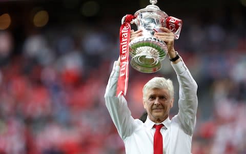 Arsenal manager Arsene Wenger celebrates with the trophy after winning the FA Cup final - Credit:  Action Images via Reuters