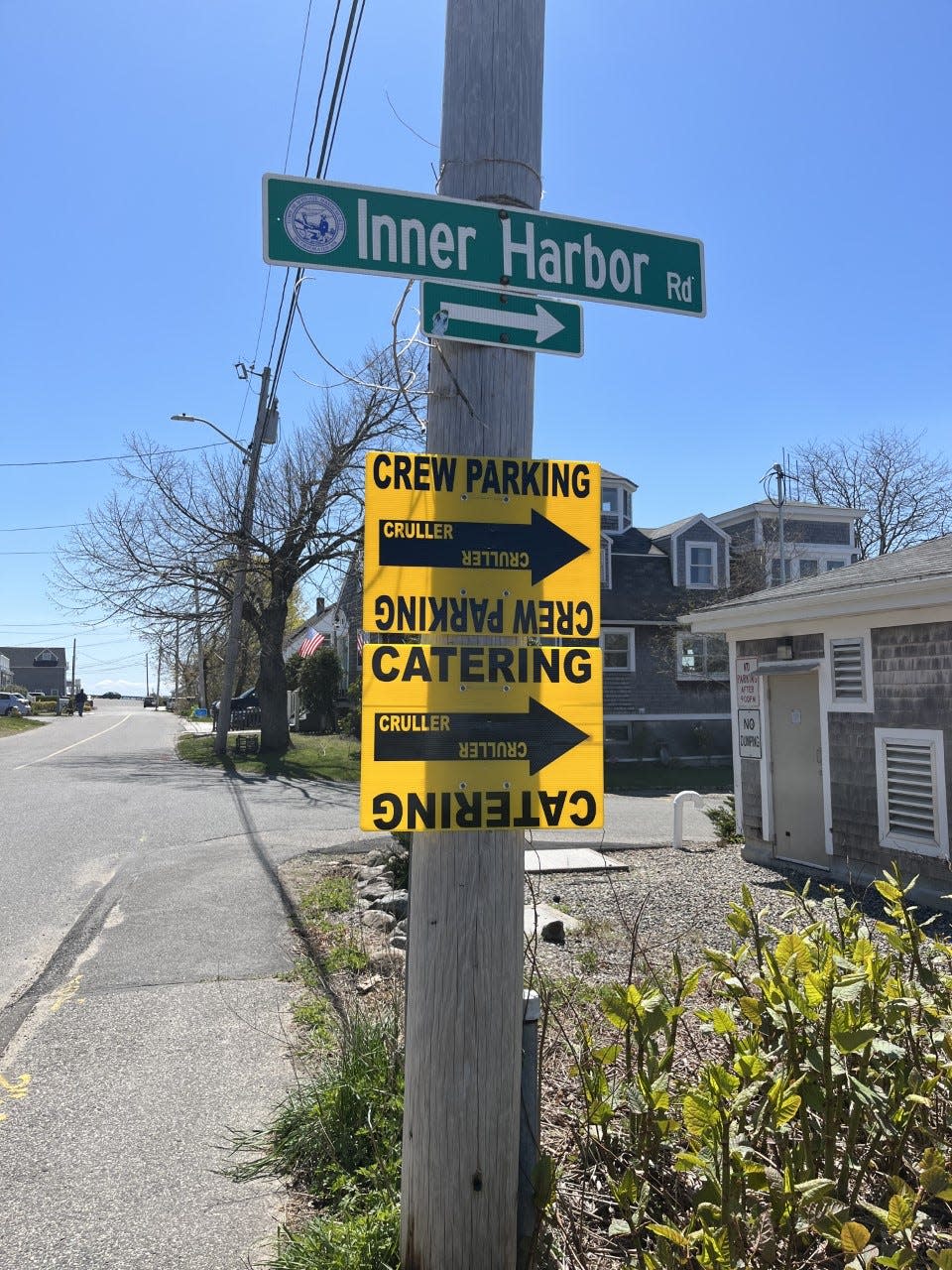 Signs direct films crews working on "Finestkind," a crime thriller being shot in Scituate, on Saturday, April 30, 2022.