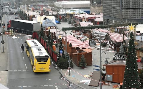 The scene of carnage after a truck ploughed through the Christmas market at Breitscheidplatz in Berlin in December 2016 - Credit: EPA