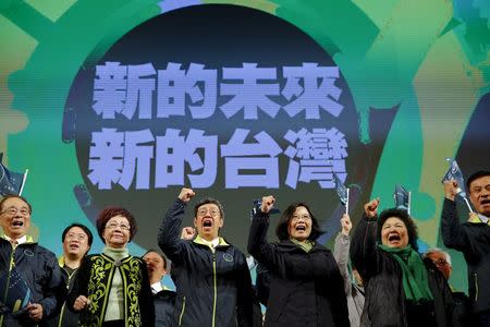 Democratic Progressive Party (DPP) Chairperson and presidential candidate Tsai Ing-wen (3rd R) celebrates her election victory with other party members at the party's headquarters in Taipei, Taiwan January 16, 2016. REUTERS/Damir Sagolj