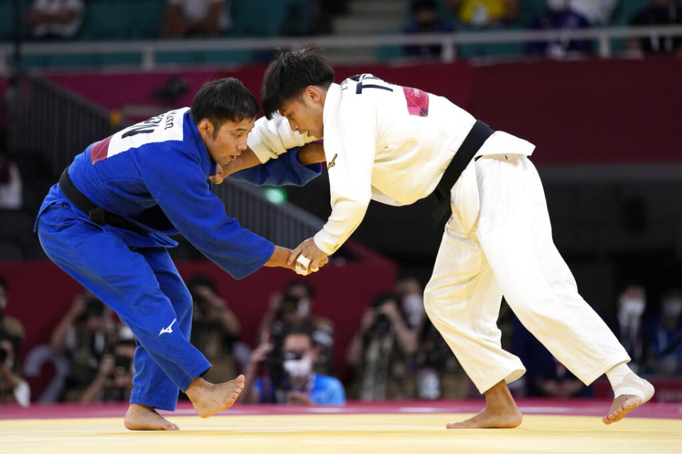 楊勇緯對上日本選手高藤直壽（圖／AP）