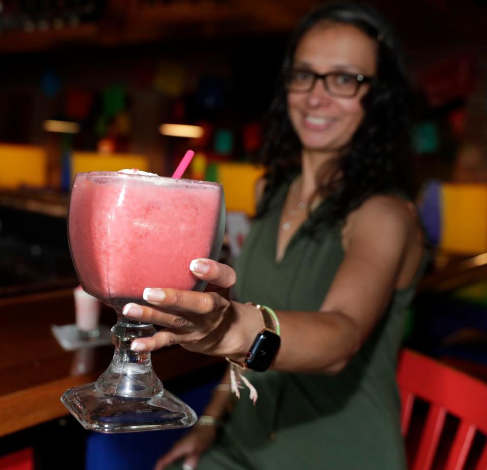 Claudia Torres, co-owner of Pablo's Mexican Grill & Cantina in Green Bay, created Barbie's Margarita for the groups of moviegoers coming in on their way to see "Barbie" at nearby Green Bay East Cinema.