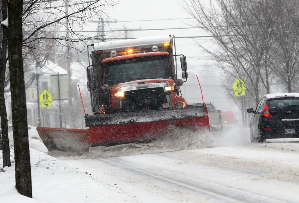 A Dover City plow clears the surface of Silver Street during a recent storm in February. An even larger storm is expected to begin Friday evening into Saturday. Forecasters say it is likely to be this winter's biggest snowfall yet.