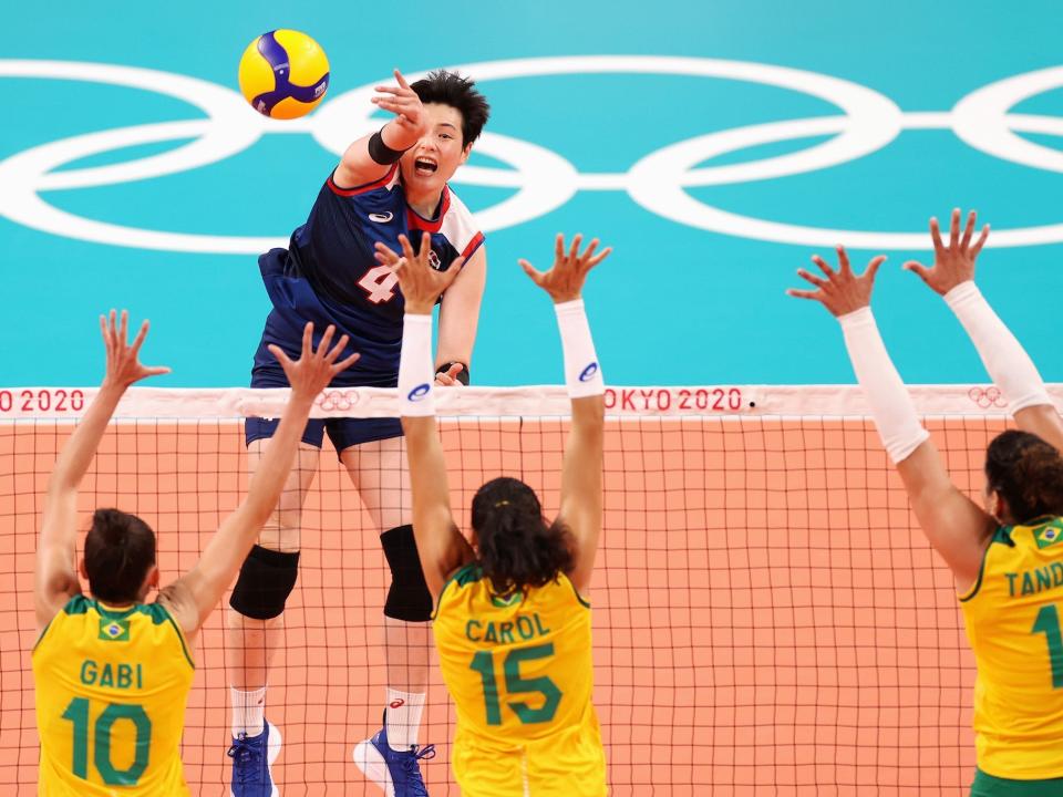 South Korea's Heejin Kim spikes during volleyball.