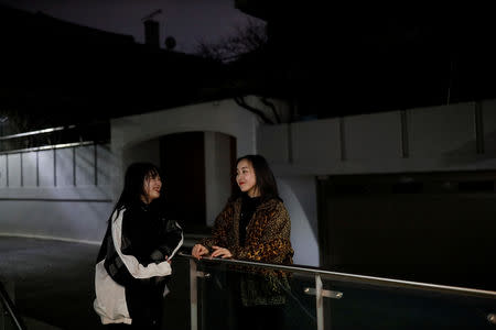 Japanese Yuuka Hasumi, 17, and Ibuki Ito, 17, also from Japan, who want to become K-pop stars, talk before performing at an Acopia School party in Seoul, South Korea, March 16, 2019. REUTERS/Kim Hong-Ji