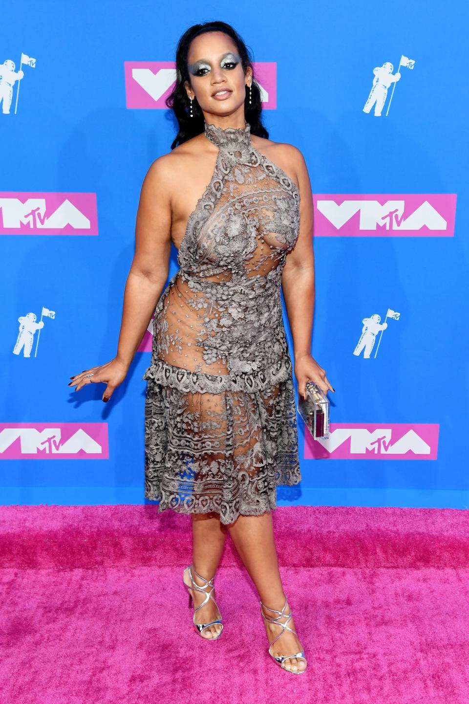 Rocking it on the pink carpet in a short version of the naked gown trend.