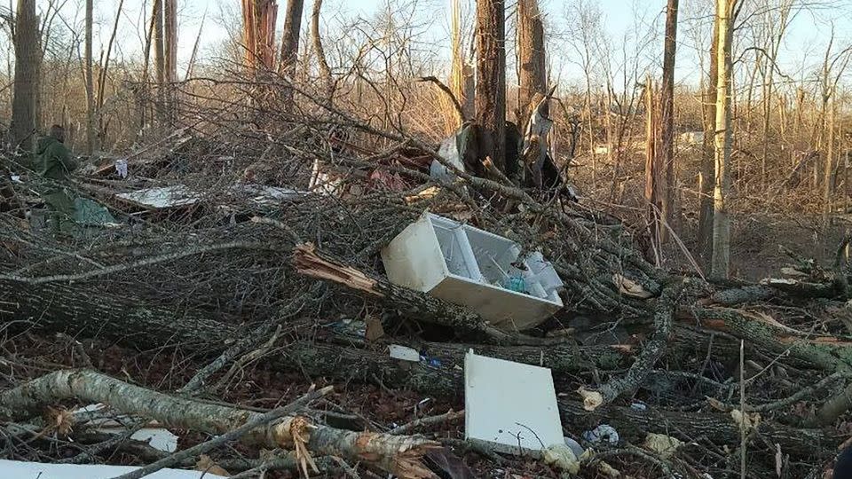 The mattress on which Sydney Moore rested with one of her 1-year-old son lies amid the remains of her mobile home, which was destroyed by a tornado. - Courtesy Sydney Moore