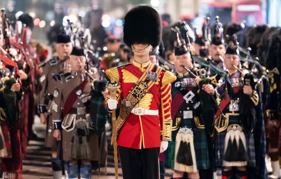 A funeral procession marches through Parliament Square during a rehearsal (PA)