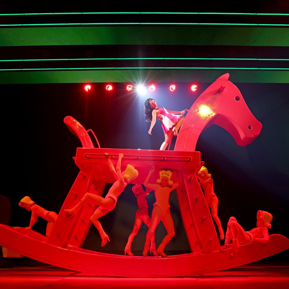 Katy Perry says standing atop the rocking horse in her Las Vegas residency show at Resorts World is a bit like her younger years surfing in California.