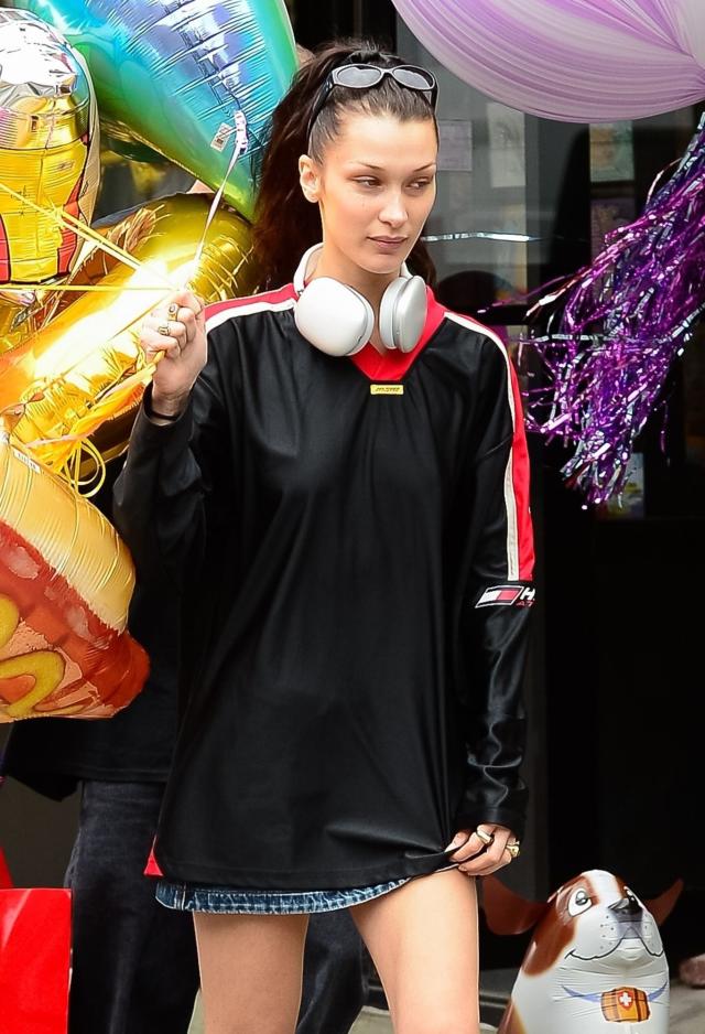 Gigi Hadid takes her daughter out for a stroll during a lunch outing with  Bella Hadid