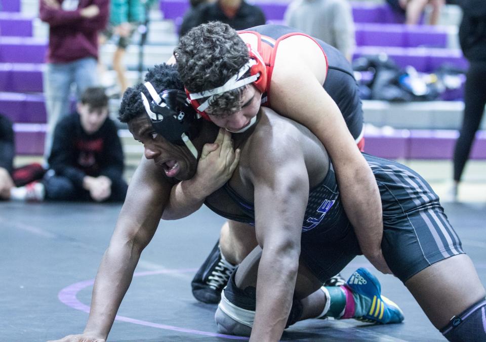 Fox Lane's Alex Berisha (top) defeated New Rochelle's DeAndre Woods in the 189-pound finals of the Murphy-Guccione Shoreline Classic wrestling tournament at New Rochelle High School on Saturday, Jan. 7, 2023.