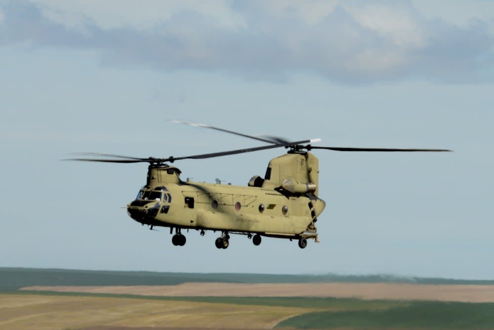 An Oregon National Guard CH-47 Chinook helicopter prepares to deploy to Afghanistan in May 2020 (John Hughel, Oregon Military Department Public Affairs)