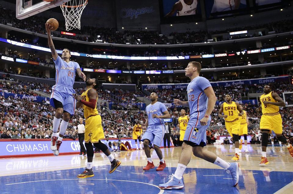 Los Angeles Clippers's Matt Barnes(22) drives for a layup during the first half of an NBA basketball game against the Cleveland Cavaliers on Sunday, March 16, 2014, in Los Angeles. (AP Photo/Jae C. Hong)