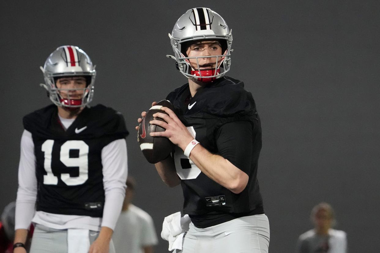 Mar 7, 2024; Columbus, OH, USA; Ohio State Buckeyes quarterback Will Howard (18) looks to throw during spring football practice at the Woody Hayes Athletic Center.The Columbus Dispatch