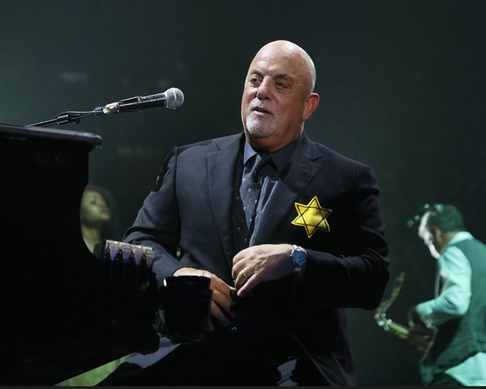 Billy Joel wears a jacket with the Star of David during the encore of his 43rd sold out show at Madison Square Garden on August 21. (Photo: Myrna M. Suarez/Getty Images)