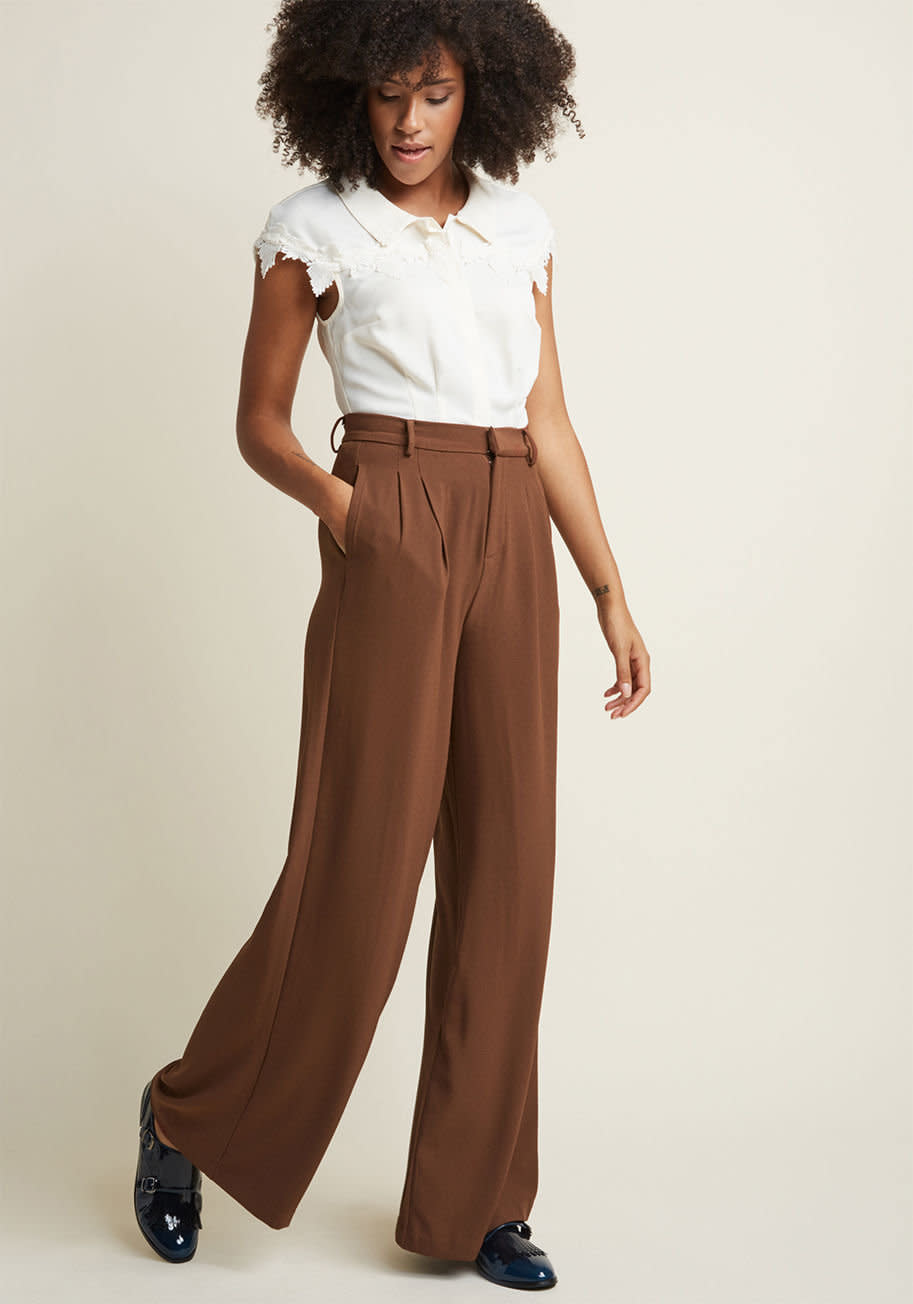 Wide-leg pants are the trouser trend that just won't let go, and it looks like they're here to stay through 2018. From wide-leg cropped trousers, to high-waist paper-bag pants, you'll see plenty of these cool and comfortable bottoms throughout 2018.&nbsp;<br /><br />Pictured: <a href="https://www.modcloth.com/shop/sale/pleated-wide-leg-trousers/154412.html" target="_blank">Pleated Wide-Leg Trousers from Modcloth</a>