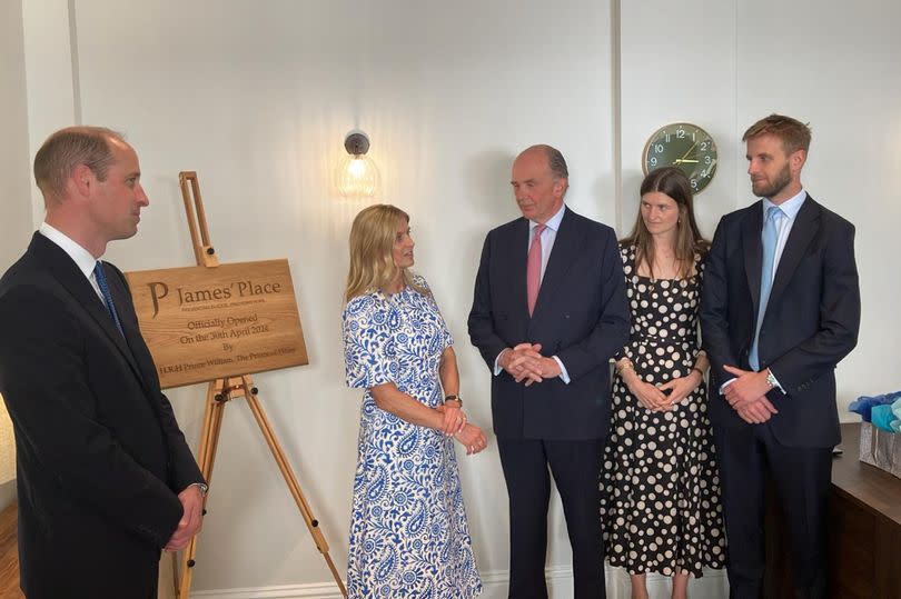 Prince William unveils a plaque with James Wentworth-Stanley