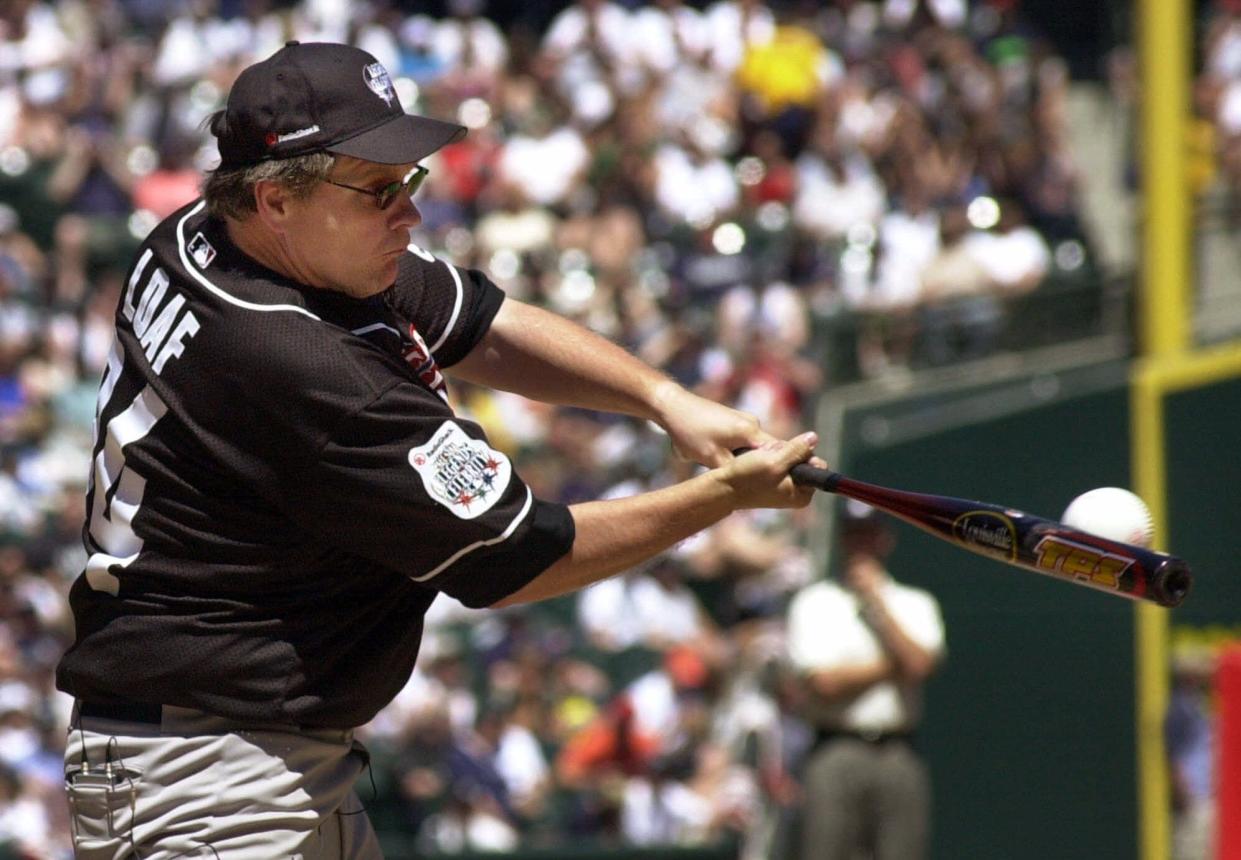 Meatloaf connects for a hit in the All Star Legends & Celebrity softball game Sunday, July 8, 2001, in Seattle. The rock 'n' roll legend, who died Jan. 20 at age 74, was a serious baseball fan.