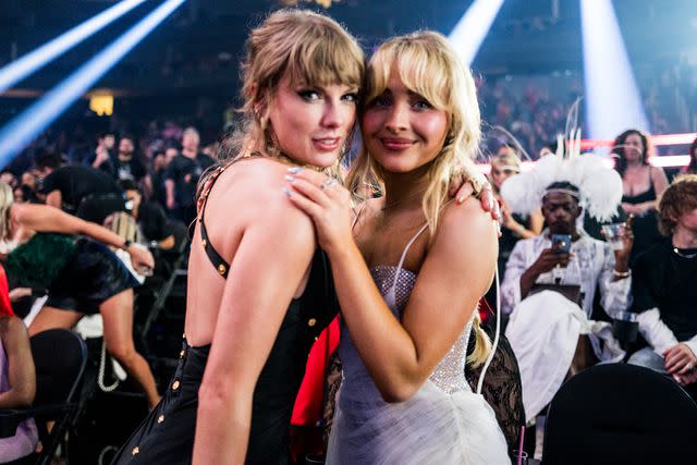 <p>John Shearer/Getty Images</p> Taylor Swift and Sabrina Carpenter at the MTV Video Music Awards in Newark in September 2023