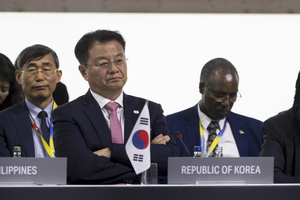 Minister Kisun Bang of Republic of Korea, second from left, attends the plenary session during the Summit on peace in Ukraine, in Obbürgen, Switzerland, Sunday, June 16, 2024. (Alessandro della Valle/Keystone via AP)