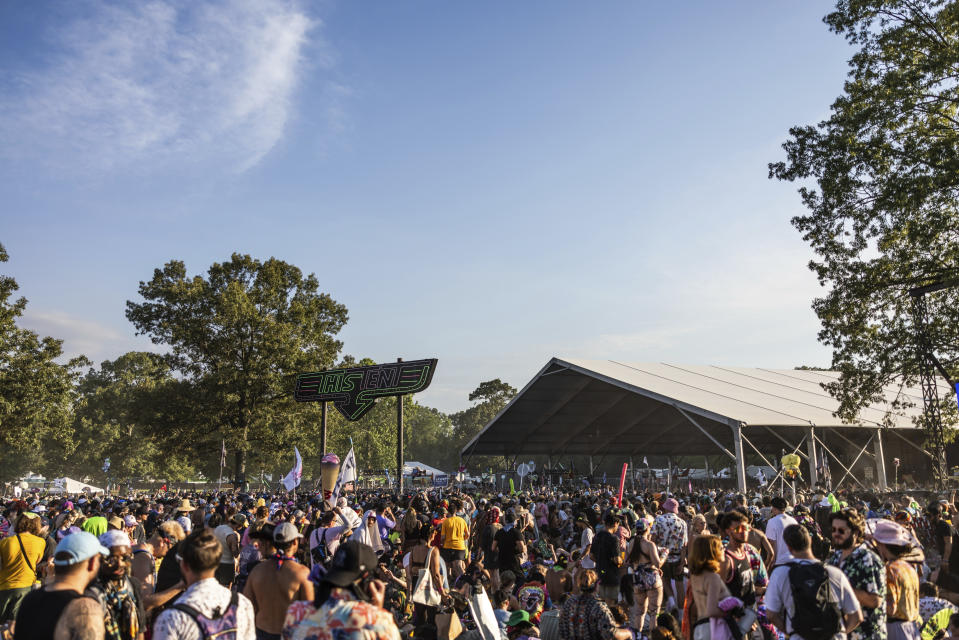 Festivalgoers are seen during the Bonnaroo Music & Arts Festival on Saturday, June 15, 2024, in Manchester, Tenn. (Photo by Amy Harris/Invision/AP)