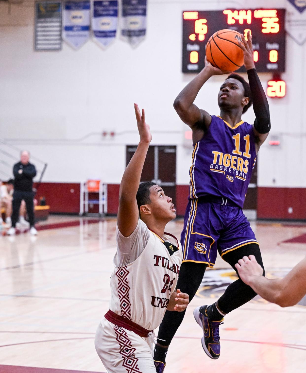 Lemoore's DeMel Turner shoots over Tulare Union's Shawnie Hayes in a West Yosemite League high school boys basketball game on Thursday, January 26, 2023. 