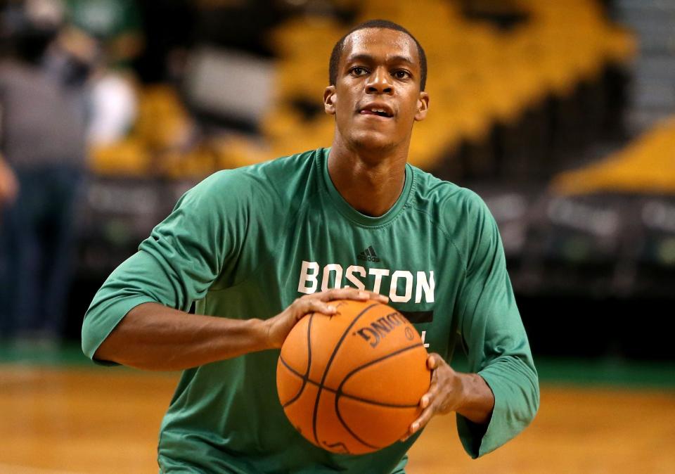 BOSTON, MA - OCTOBER 22:  Rajon Rondo #9 of the Boston Celtics warms up prior to a preseason game against the Brooklyn Nets at TD Garden on October 22, 2014 in Boston, Massachusetts. NOTE TO USER: User expressly acknowledges and agrees that, by downloading and or using this photograph, User is consenting to the terms and conditions of the Getty Images License Agreement.  (Photo by Mike Lawrie/Getty Images)