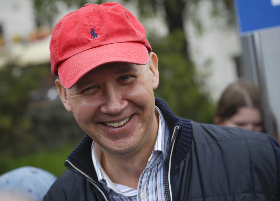 In this picture taken on Wednesday, May 26, 2020, Valery Tsepkalo, a potential candidate in the upcoming presidential election, smiles in Minsk, Belarus. The central elections commission in Belarus has rejected a top challenger's bid to run against authoritarian President Alexander Lukashenko in this summer's election. Tsepkalo, a former ambassador to the United States and a founder of a successful high-technology park, submitted 160,000 signatures on petitions to get on the ballot for the Aug. 9 election, but the commission said only 75,000 were valid less than the 100,000 needed.(AP Photo/Sergei Grits)