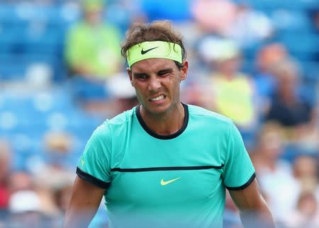 Aug 17, 2016; Mason, OH, USA; Rafael Nadal (ESP) reacts against Pablo Cuevas (URU) on day five during the Western and Southern tennis tournament at Linder Family Tennis Center. Mandatory Credit: Aaron Doster-USA TODAY Sports