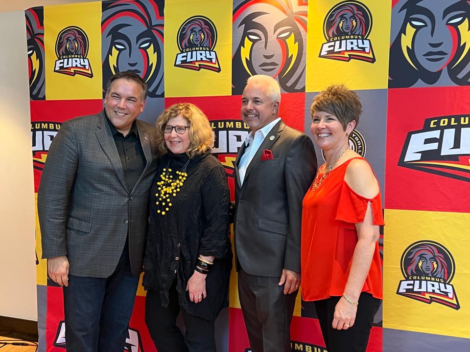 Columbus Fury co-owners Jeff and Beth Gilger pose with Greater Columbus Sports Commission Executive Director Linda Logan and Columbus Mayor Andrew Ginther.