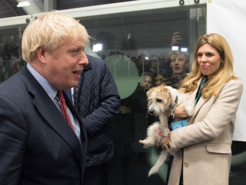 Boris Johnson with partner Carrie Symonds and dog Dilyn at the count in his Uxbridge constituency during the 2019 general electionPA