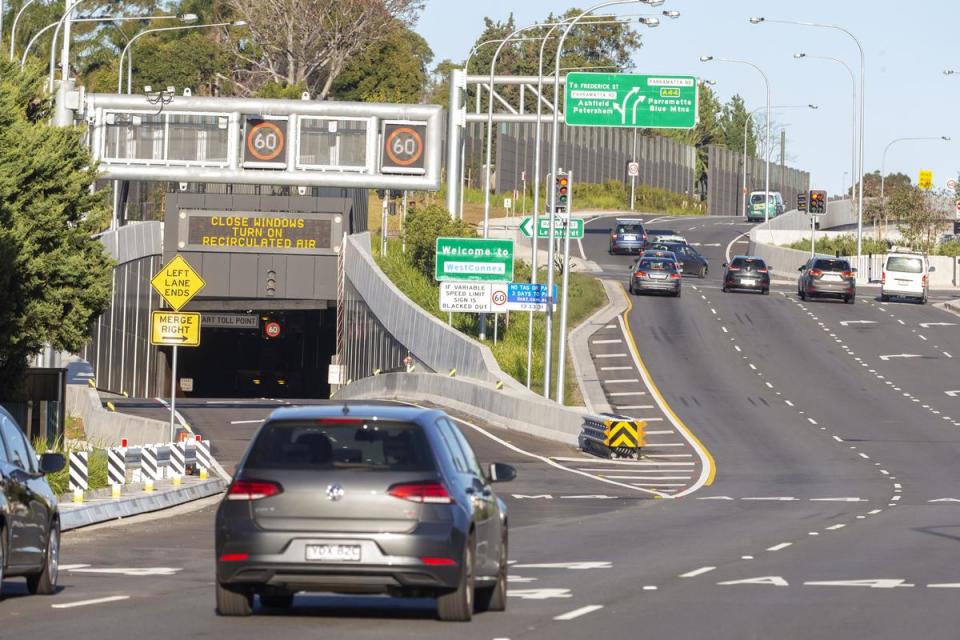 Average speed cameras positioned above Sydney highways.