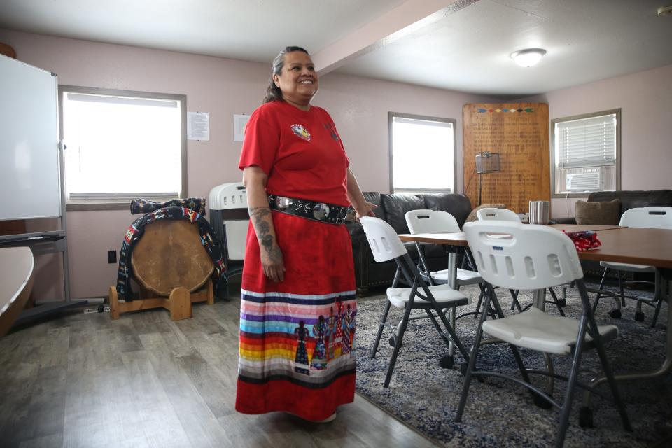Toni Handboy, a counselor for Wakpa Waste Counseling Services, stands inside Inka Najin Oti (“The Red House") addiction recovery house in Eagle Butte on the Cheyenne River Reservation on Sunday, June 16, 2023.