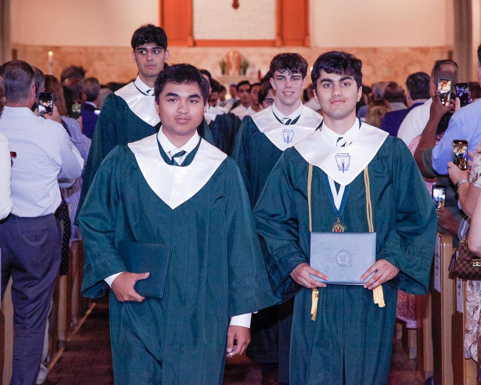 Saint Joseph High School, Metuchen, graduates process out of Church of the Sacred Heart in South Plainfield, where their Sunday, May 22, Baccalaureate Mass and commencement ceremony were held.