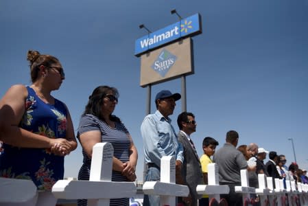 People pay their respects two days after a mass shooting in El Paso