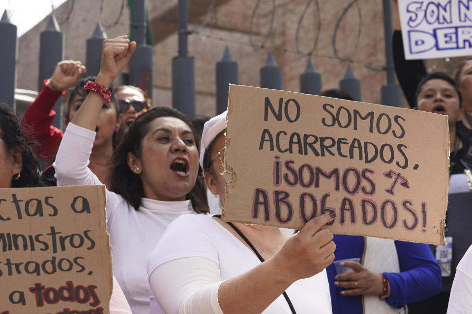 Judicial workers protest funding cuts to next year's judiciary budget as they start a national, two-week strike, outside their offices in Mexico City, Thursday, Oct. 19, 2023. (AP Photo/Marco Ugarte)